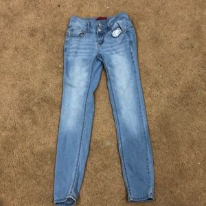 small, butt lifting, blue skinny jeans